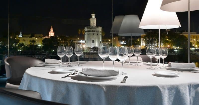 abades triana restaurant seville at night