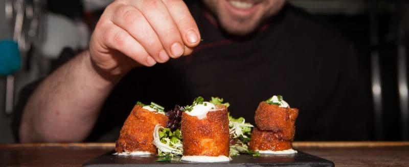 chef preparing tapas malaga